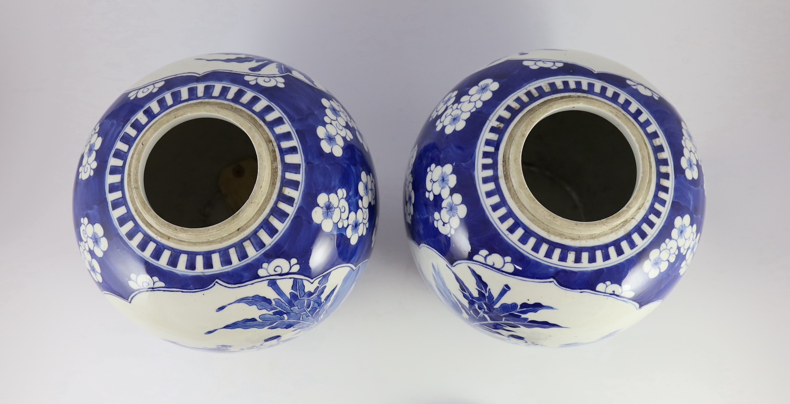 A pair of large Chinese blue and white jars and covers, 19th century, 33cm high